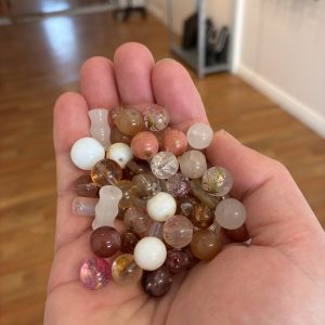 Brown bead mix in a hand